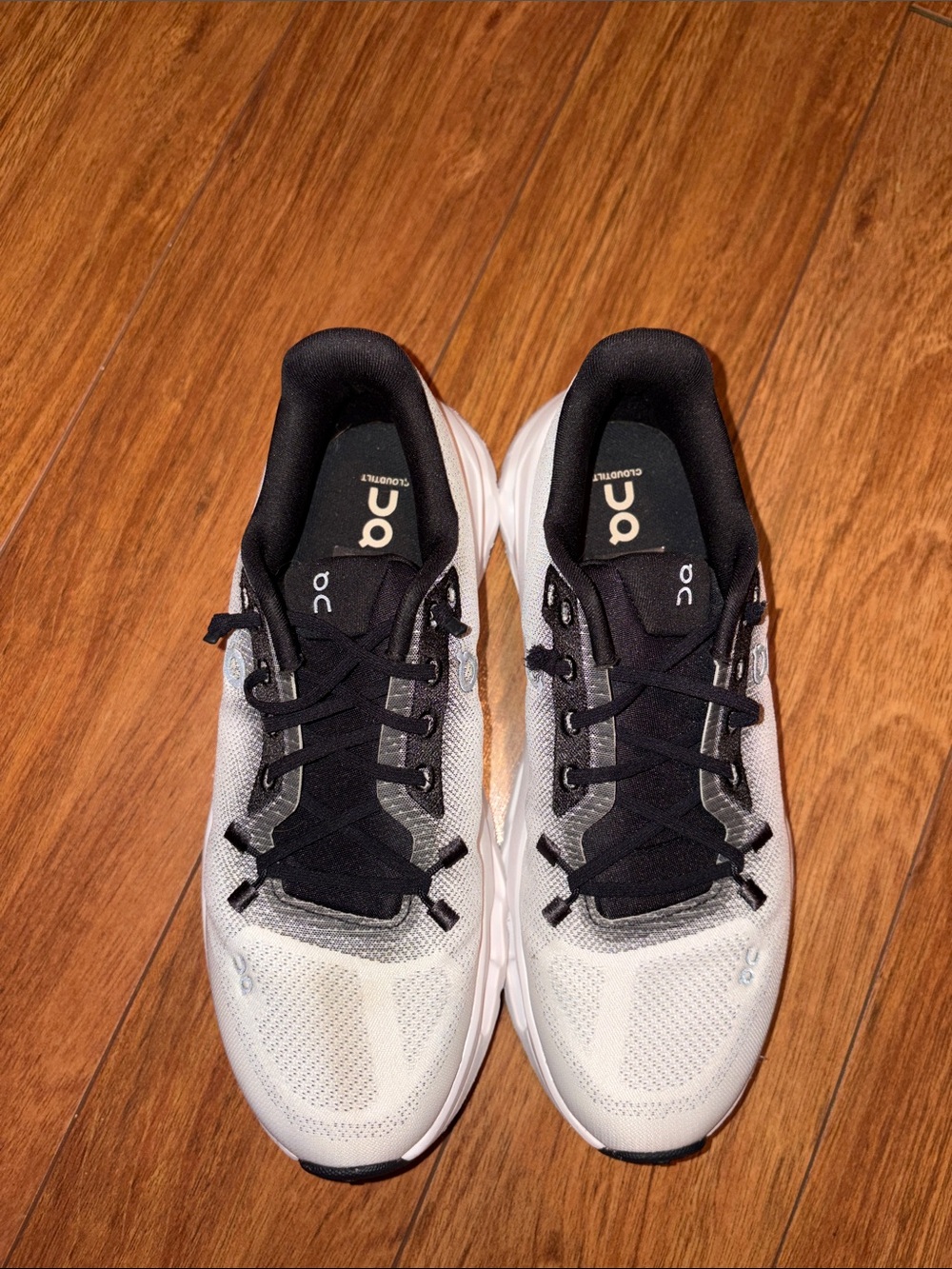 On Running women’s Cloud Sneakers in White and Black